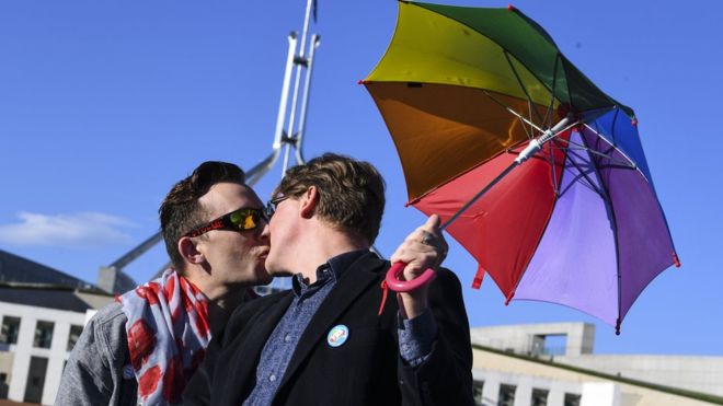  Same-sex marriage supporters outside Australia's parliament on Thursday 