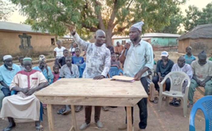 Mr. Awal Ahmed Kariama, addressing participants at the Nyong Community Durbar, Karaga.