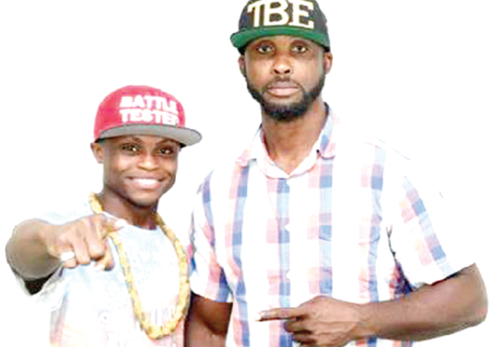 Paul Dogboe (right) and his son, Isaac