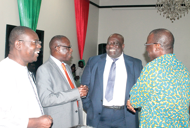 Mr Samuel Boakye-Appiah (left), the Managing Director of ECG, Mr Kabral Blay-Amihere (2nd left), the Board Chairman of GRIDCo, Mr Jonathan Amoako-Baah (3rd left) and Mr Emmanuel Antwi-Darkwa, the Chief Executive of VRA, interacting after the meeting. BELOW: Participants in the meeting