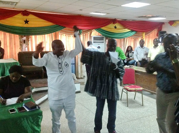  Nana Oduro Numapau (right), the Metropolitan  Electoral Officer, declaring Mr Lawer as the winner of the election
