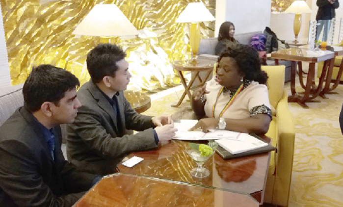 Ms Juliet Adutwumwaa Gyamfi (right), CEO of  Beautiful Beneath, one of the businesswomen on the First Lady’s entourage clinching a deal with Chinese investors 