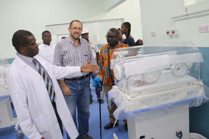 Professor Baffour Opoku (left) explaining to the Daily Graphic reporter how the hi-tech incubator works, while the Project Manager, Mr Stephen Coret, looks on.