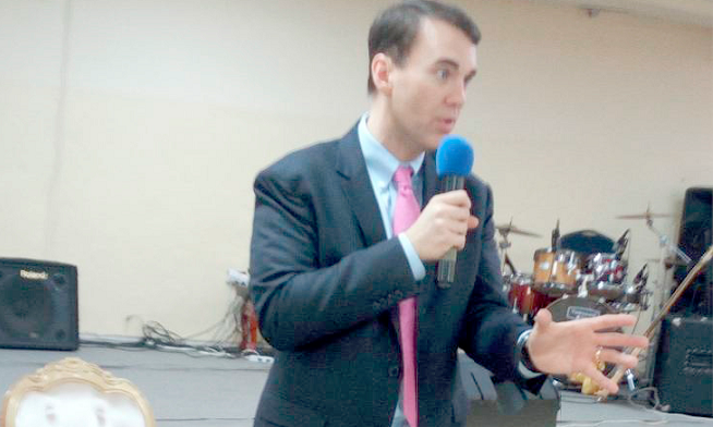 Prof. Michael Linsey addressing the students and staff of the Dominion University College