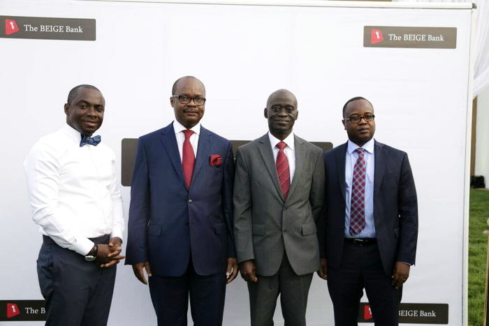 Dr Ernest Addison (2nd right) with Dr Maxwell Opoku-Afari, First Deputy Governor (right), Mr Mike Nyinaku (left) and  Mr Kofi Otutu Adu Labi (2nd right), Board Chairman, BEIGE Bank