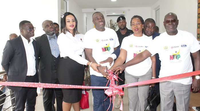 Mr Yaw Asamoah (left), Mr Ibrahim Awal (4th left),  and Mrs Afua Asabeah Asare (2nd right), the special advisor to the minister, during the sod cutting. Picture: Benedict Obuobi