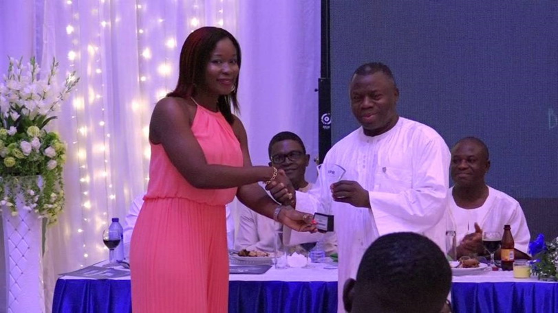 Mrs. Ama Amoah, Corporate Communications &amp; Public Affairs Manager of Nestlé Ghana, receiving the award from Mr. Alhasssan Andani, MD of Stanbic Bank Ghana
