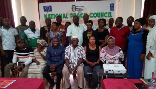 A group picture of participants at the National Peace Council review forum.