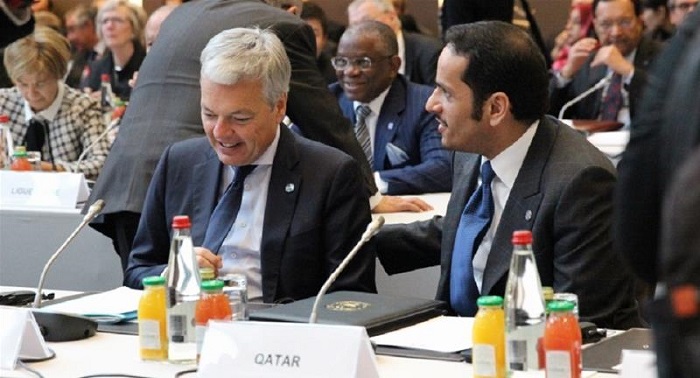 Qatari Foreign Minister Sheikh Mohammed bin Abdulrahman Al-Thani (right) was one of more than 70 officials attending Sunday''s conference [Robert Kennedy/Al Jazeera]
