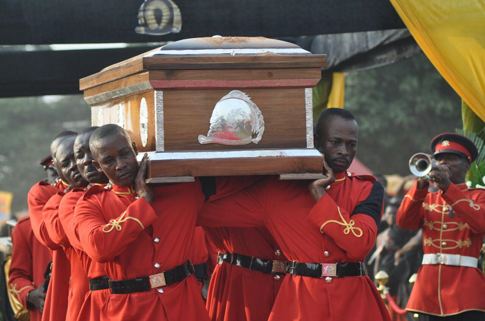 Pallbearers carrying the casket containing the remains of the late Asantehemaa for burial