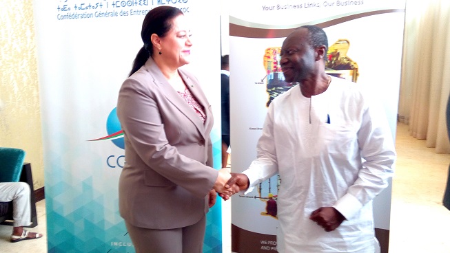 Mr Ken Ofori-Atta (right), Finance Minister-designate, shaking the hand of Mrs Miriem Bensalah (left), the leader of the Moroccan Business Delegation.