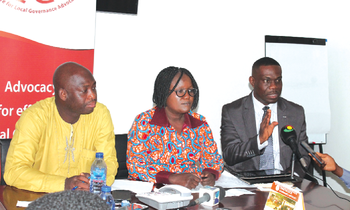  Ms Gladys Gillian Tetteh (middle) responding to a question. Those with her are Mr Saaka Sayuti (left), Board Member of CLGA, and Dr Eric Oduro Osae (right), Local Governance Expert.  Picture: Maxwell Ocloo