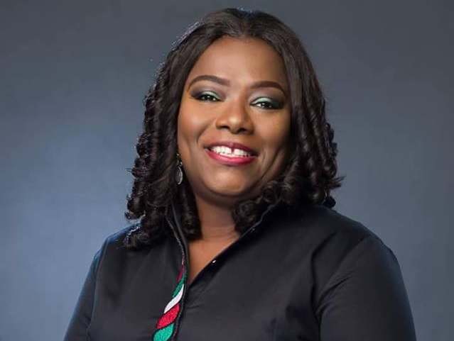 Nana Oye, the Minister for Gender, Children and Social Protection with the plaque