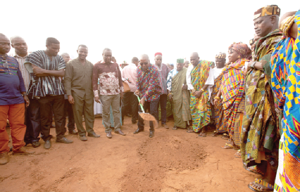 President Mahama (middle) cutting the sod for commencement of work on the project