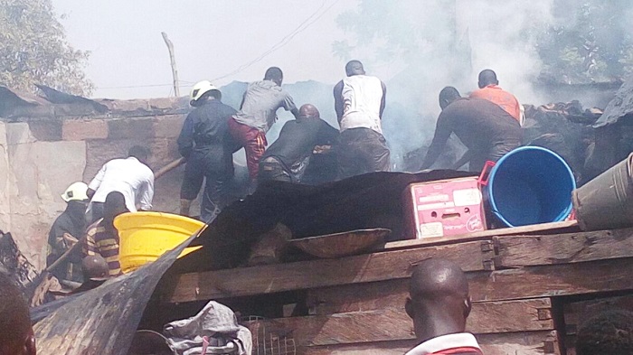 Some residents trying to douse the fire