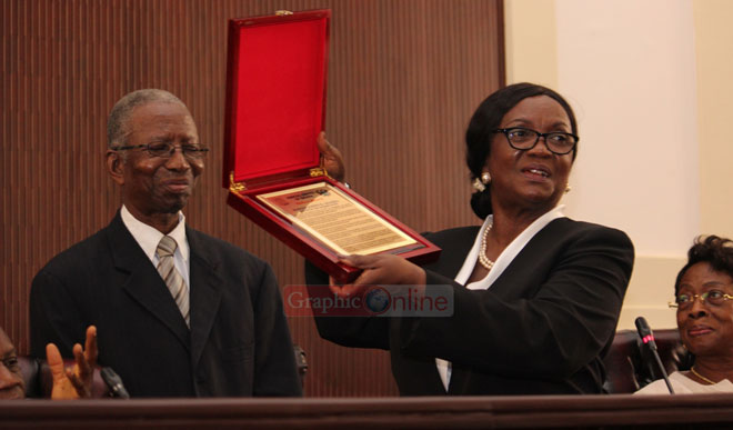 Chief Justice Georgina Theodora Wood displaying the citation presented to Justice Joseph Akamba (left) Picture: NII MARTEY M BOTCHWAY