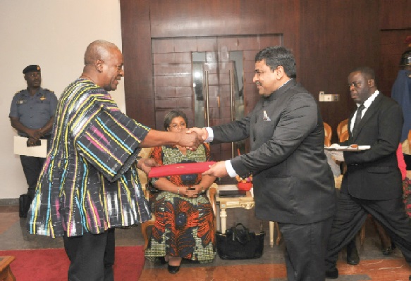President Mahama receiving the letters of credence from Mr Birender Singh Yadav, the High Commissioner of India