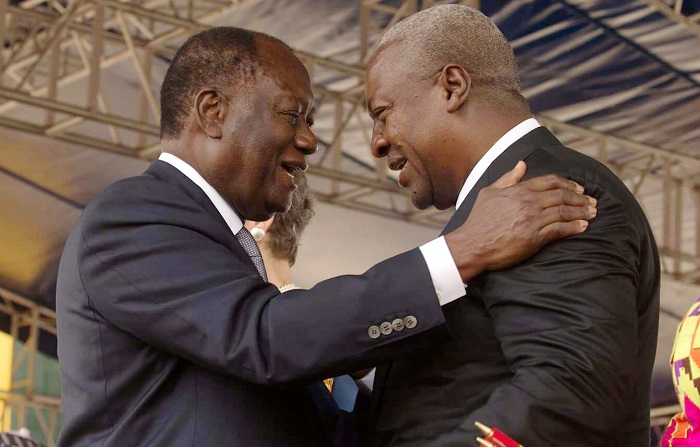 Well done my brother, President Alhassane Dramane Ouattara of Cote d'Ivoire tells Former President Mahama at the Black Star Square last Saturday. Picture: EBOW HANSON.