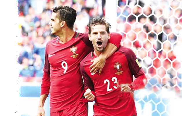 Andre Silva joins his brother, Andrien (right) to celebrate his winning goal for Portugal