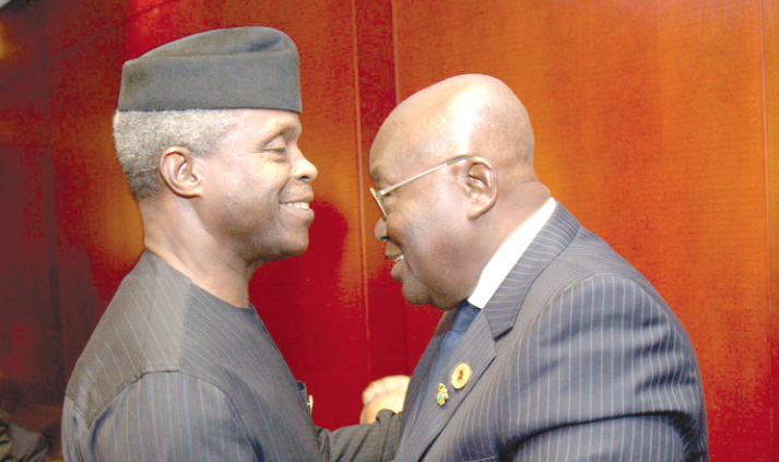 President Akufo-Addo with the acting President of Nigeria, Professor Yemi Osibanjo. INSET: The award given to President Akufo-Addo.