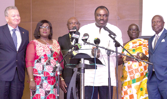 Mr Robert Ahomka-Lindsey, Deputy Minister, Trade and Industry, launching the 50th anniversary celebrations of GHACEM in Accra. With him include Dr Ishmael Yamson (right), Board Member, and Mr Morten Gaten (left), Managing Director, GHACEM