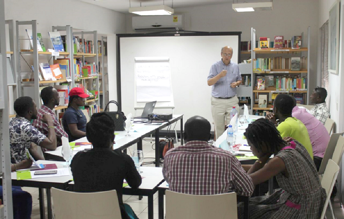 • William Gilcher making a point at one of the workshop sessions
