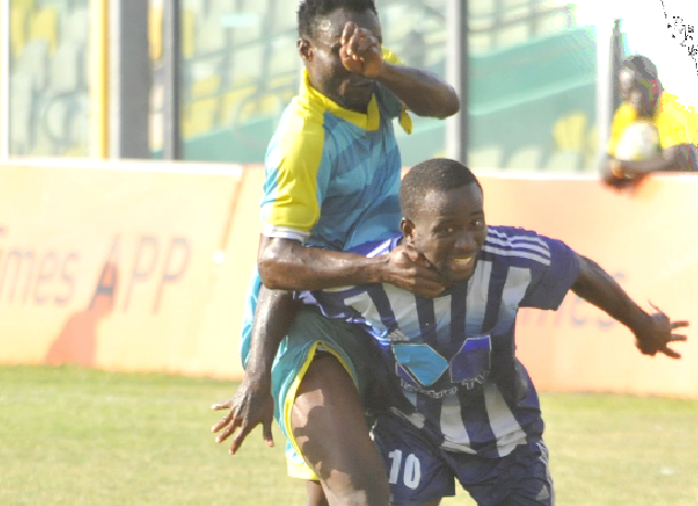 Olympics’ Coffie Bekoe is being retrained by his All Stars marker during the game. Picture EBOW HANSON