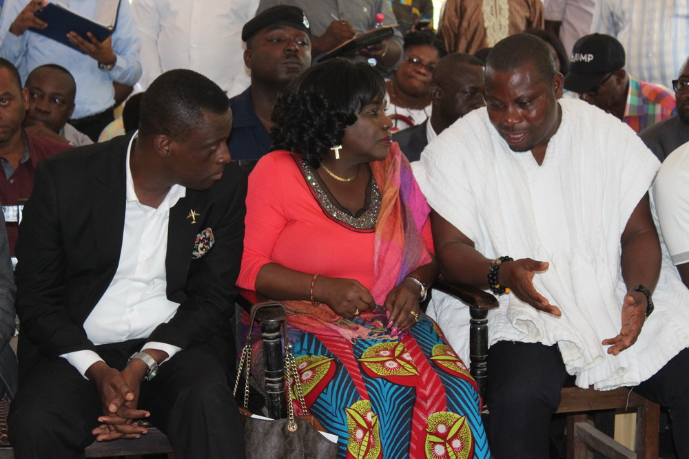 Mrs Cecilia Dapaah, the Minister of Aviation, interacting with Mr Kwabena Okyere Darko-Mensah (left) the Deputy Minister of Aviation and Mr Jonathan Teye Doku (right), the DCE of Ningo Prampram