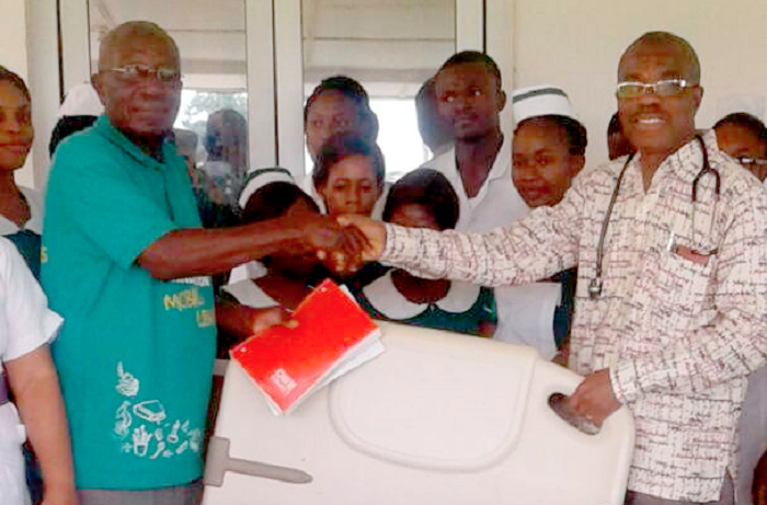  Dr Osei-Bonsu (right) thanking Mr Godwin Atidiga after the presentation