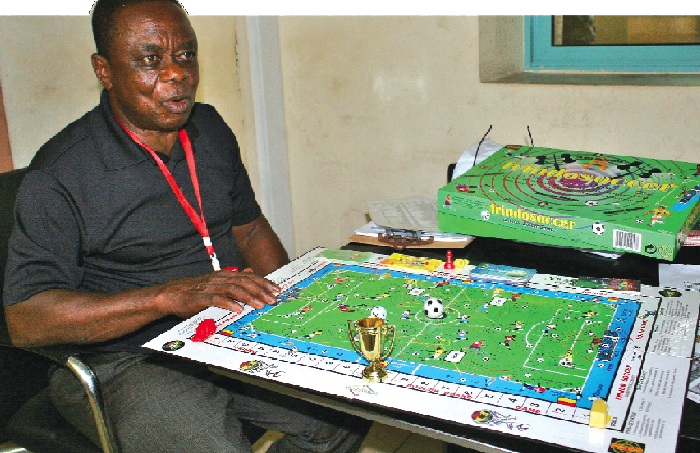 Mr Yaw Frimpong Manso explaining how  Frndo soccer is played during an interview with the Daily Graphic