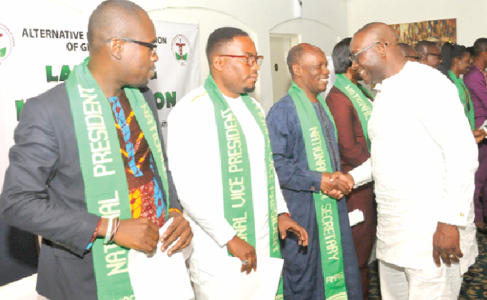 Mr Yaw Buaben Asamoa congratulating the executive members