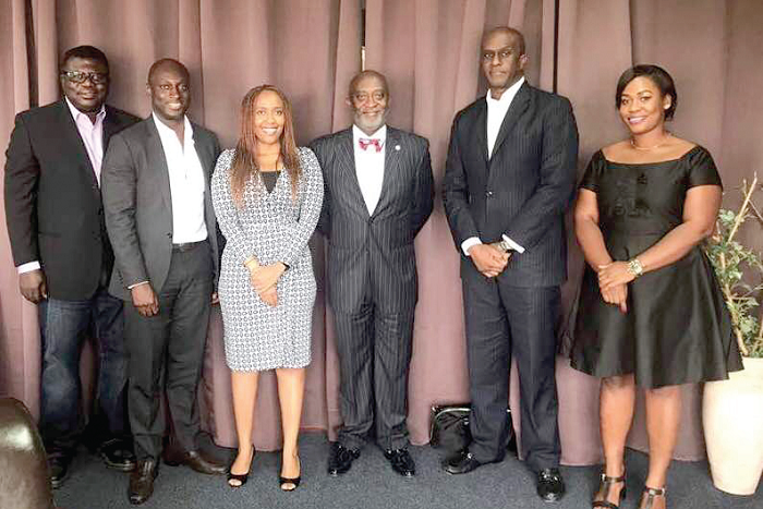 Mr Yofi Grant (3rd right) with the delegation from Carlyle Group after their meeting