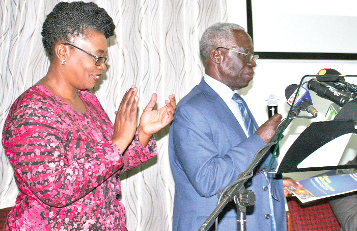 Mr Yaw Osafo Maafo (2nd left), Senior Minister, launching the Ghana Infrastructure Report Card 2016