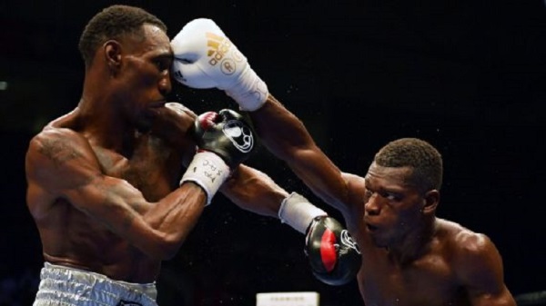 Richard Commey, right, has been ordered to face fellow lightweight Alejandro Luna in a title elimination bout, with an eye on a possible rematch with Robert Easter Jr., left, to whom he lost to by split decision last September. Drew Hallowell/Getty Images