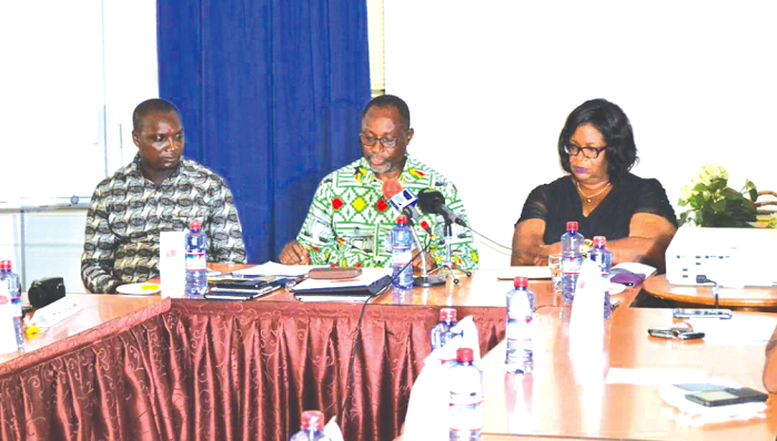  Nii-Noi Daniel A. Adumuah (middle) addressing the journalists. With him are Mrs Moira Ewa (right), the Municipal Coordinating Director, and Mr Joseph Odai Boye, the Presiding Member
