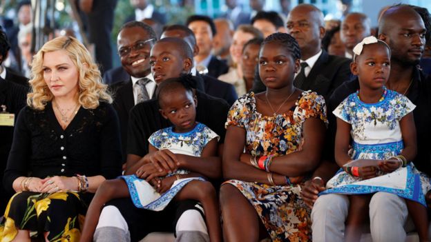 The singer was pictured this month with the twins and her other children, David and Mercy