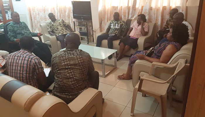  Ga South Municipal Assembly (GASMA), Mr Joseph Nyarni Stephen (arrowed), and the Municipal Coordinating Director, Mr Ben Armah, (on his right) explaining some issues to the members of the landowners association
