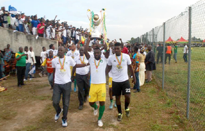 Aduana captain, Emmanuel Akuoko, leads the team to parade the GPL trophy