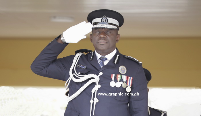 Inspector General of Police, David Asante Apeatu, taking the salute at a recent passing out of police recruits