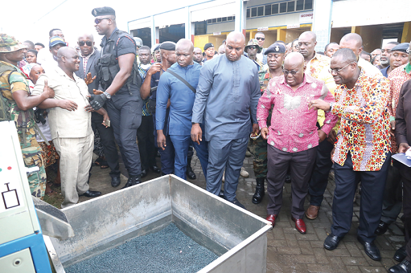 Dr Joseph Siaw Agyapong (right) explaining how the plant works to President Nana Addo Dankwa Akufo-Addo