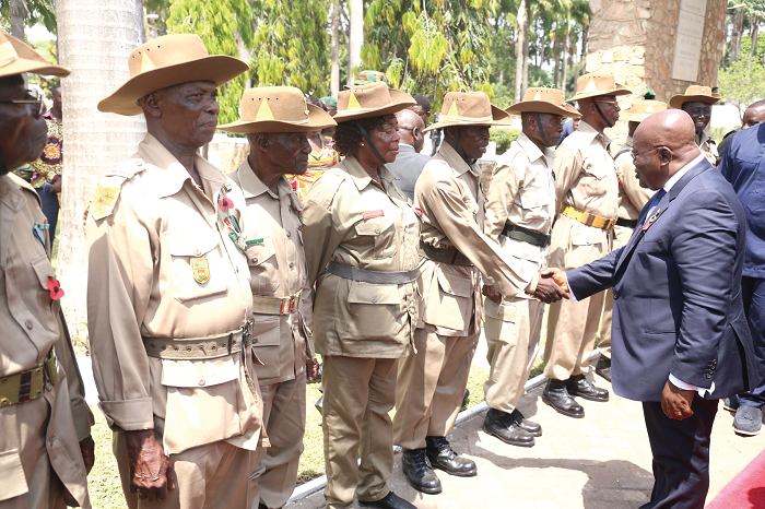 President Akufo-Addo shaking hands with some veterans after the ceremony in Accra.