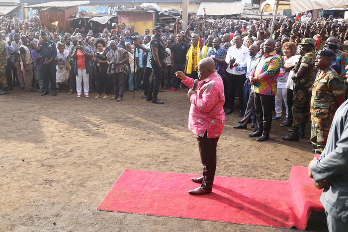 President Akufo-Addo addressing a section of the spare parts dealers at Abossey Okai in Accra.