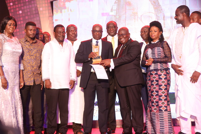 President Akufo-Addo presenting the Overall Best Industrial Company of the Year award to Mr Tony Oteng-Gyasi, CEO of Tropical Cable and Conductor at the ceremony in Accra
