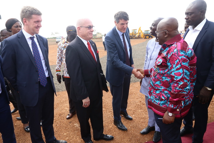 Mr Stephen Jennings (3rd right), the CEO and Founder of Rendeavour, welcoming President Akufo-Addo to the sod-cutting ceremony at Appolonia