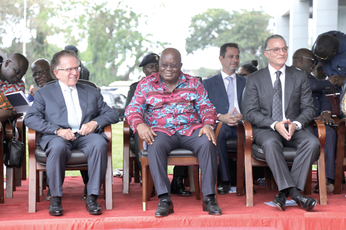 Top officials of Dream Realty; Mr Jamil Ibrahim (left), Chairman, Mr Haysam  Fakhry, Director, and Mr Karim Jamil Ibrahim (2nd right), Managing Director, with President Akufo-Addo on the dais.