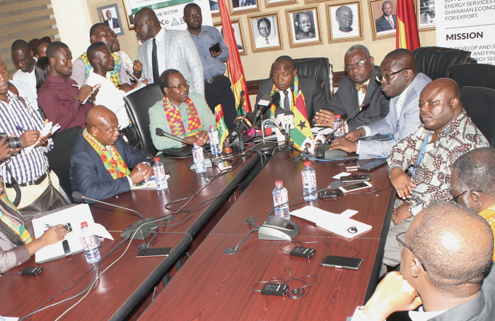 r Boakye Agyarko (5th right), Minister of Energy, and other officials of the Ministry of Energy holding a roundtable discussion with the delegation from Burkina Faso (left)