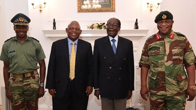  Mr Mugabe (second right) under house arrest, posing alongside Zimbabwe Defence Forces Commander General Constantino Chiwenga (right) 