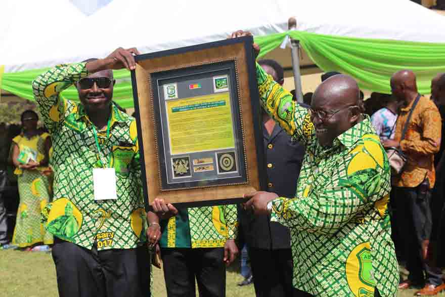 President Akufo-Addo being presented with an award by ABUSCO