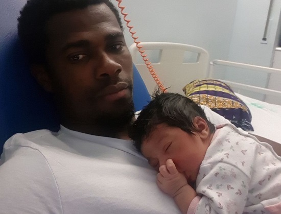 Razak Brimah and his newly-born baby girl Atu in Spain