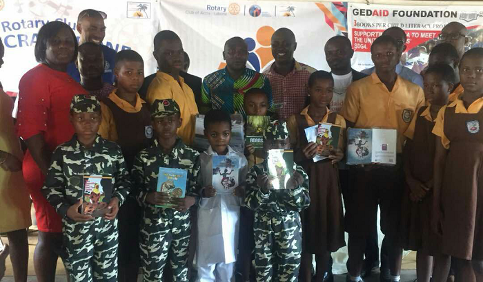 Officials from Rotary and GEDAID Foundation in a group photograph with some of the beneficiary schools